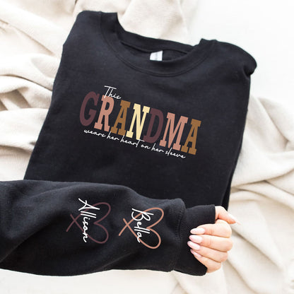 50% OFF🔥Personalized MAMA Wears Her Heart On Her Sleeve Sweatshirt