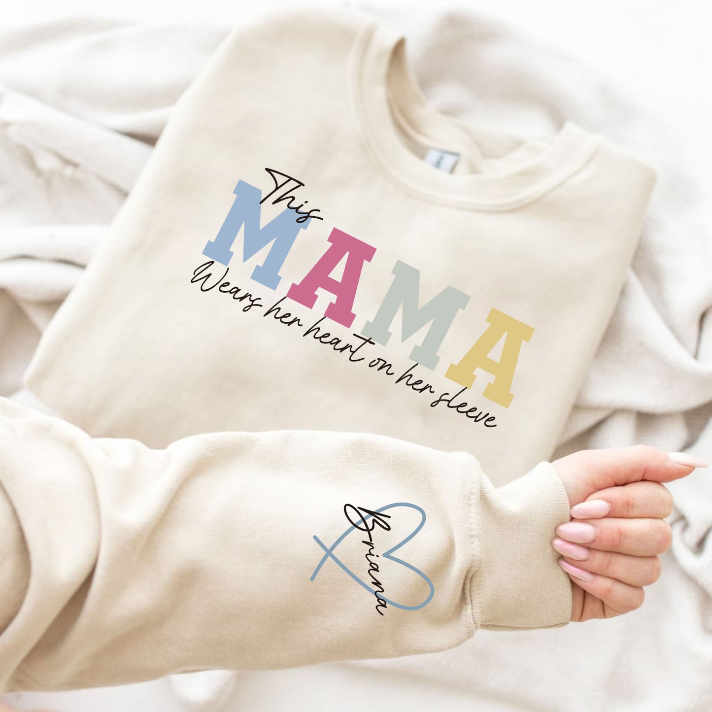 50% OFF🔥Personalized MAMA Wears Her Heart On Her Sleeve Sweatshirt